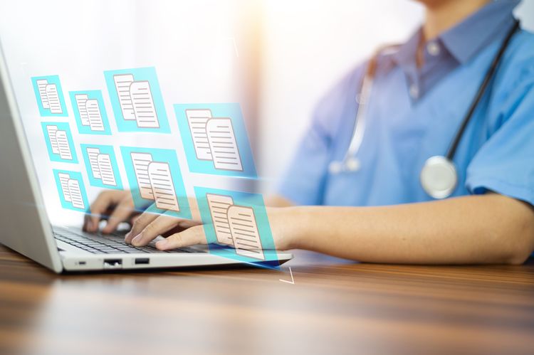doctor-using-computer-document-management-system-dms-online-documentation-database-process-automation-efficiently-manage-files (3).jpg