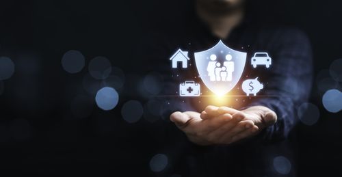 businessman-holding-giving-insurance-assurance-icon-including-family-health-real-estate-car-financial-risk-management-concept (1).jpg