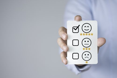 businessman-holding-product-service-evaluation-sheet-customer-satisfaction-concept (1).jpg