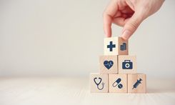 health-insurance-concept-reduce-medical-expenses-hand-flip-wood-cube-with-icon-healthcare-medical-coin-wood-background-copy-space (2).jpg